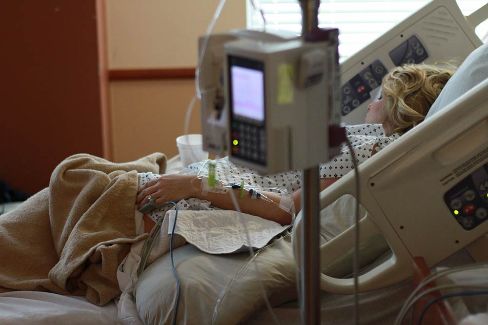 woman on hospital bed