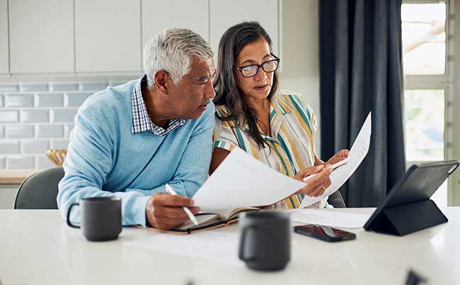 a couple reviewing paperwork